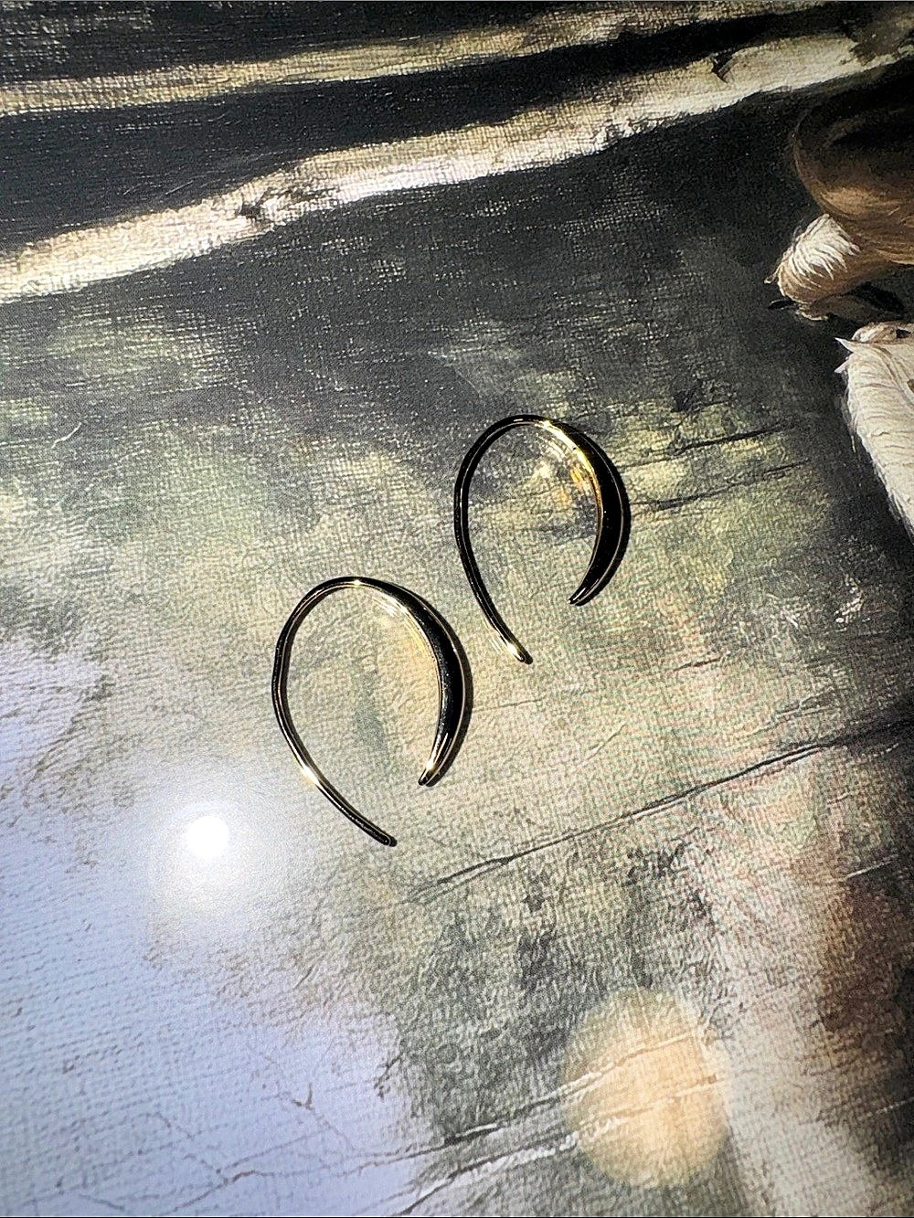 Local eclectic gold earring
